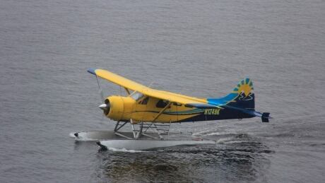 A photo taken Aug. 5, 2021, photo provided by Lee LaFollette shows a de Havilland Beaver aircraft departing the Port of Ketchikan, Alaska. Foggy, reduced-visibility conditions have delayed efforts to recover the wreckage of a sightseeing plane that crashed in southeast Alaska, killing six people. Alaska Missing Plane
