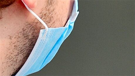 Generic Covid photo from Montreal during the summer on 27 Jul 2021. See close up of man wearing face mask. Montreal Covid, 27 Jul