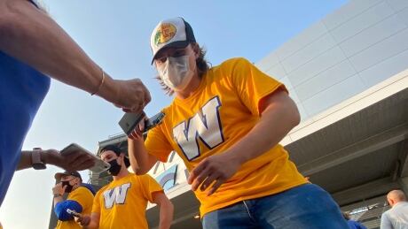 Winnipeg Blue Bombers fans return to IG Field on Thursday 05 Aug 2021. The CFL had not seen action in the city since 2019 due to Covid. Fans will have to show proof of Covid vaccination. Bomber fans return to IG Field