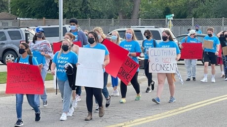 Dozens of Fanshawe College students and staff marched down Oxford Street Monday, Sept. 20, 2021 to call for an end to sexual violence. Fanshawe College students