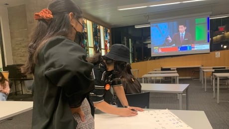 Post-secondary students from King's University College in London, Ont., predict outcomes as results from the federal election trickle in. Students federal election london