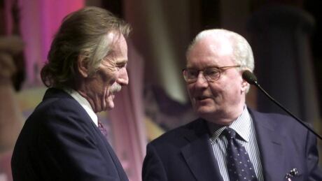 Allan Slaight, longtime friend of Gordon Lightfoot and Standard Broadcasting co-founder, congratulates Gordon Lightfoot for being inducted into the Canadian Association of Broadcasters Hall of Fame at an awards ceremony in Ottawa on Oct 30, 2001. Gordon Lightfood and Allan Slaight