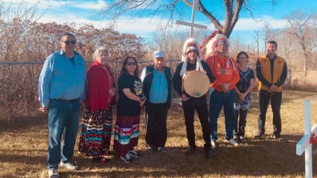A small group gathered at the site of the former residential school in Elkhorn, Man., on Monday, Oct. 19, 2021, for a ceremony to honour children who died at the school. Elkhorn Ceremony