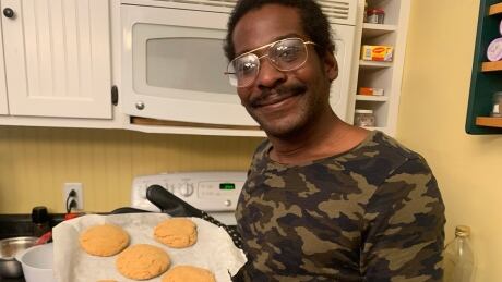 Xaiver Campbell bakes ginger molasses cookies, an ingredient that he considers a staple on both islands he's lived, Newfoundland and Jamaica. Xaiver Campbell unearthed baking cookies
