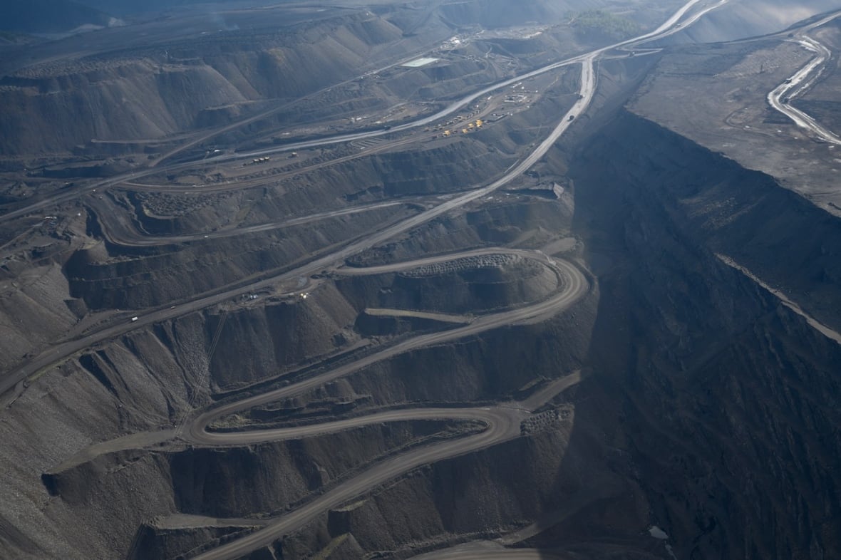 An aerial shot of winding roads in a mine.