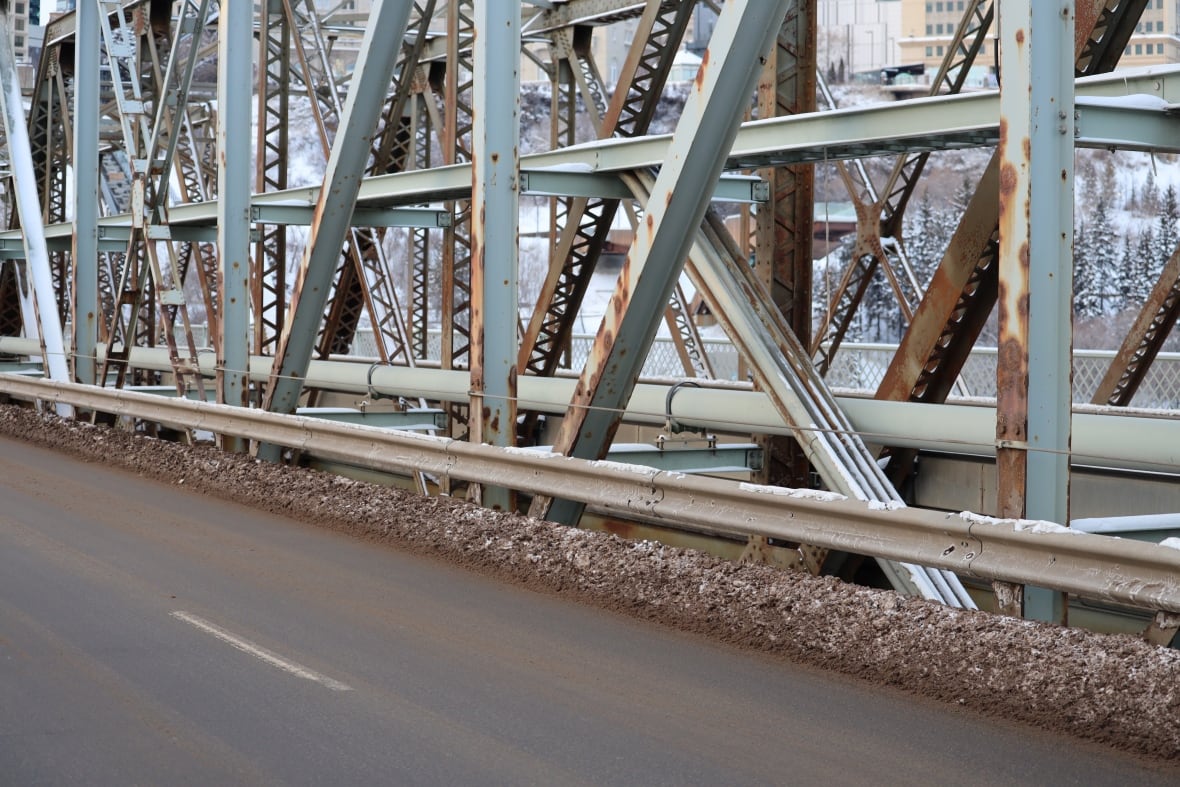  The bridge's rust is clearly visible today and a City of Edmonton lawsuit regarding the paint job is ongoing. 