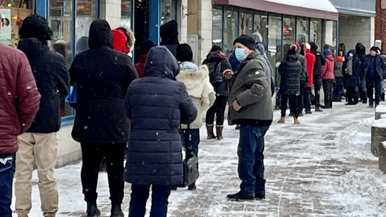 COVID-19 in Quebec: What you need to know Thursday; Quebecers line up outside a pharmacy in a bid to receive free, rapid COVID-19 tests.