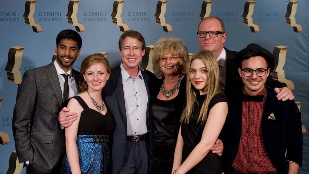 A group of people of varying ages at an awards show.