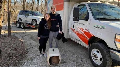 Christine Lee, Colin McAndrew and Momo - in the carrier - moved from St. Andrews, Man. to Calgary last year. Population growth in the Winnipeg metropolitan area has flatlined, mainly because of people leaving for other provinces. christine-lee
