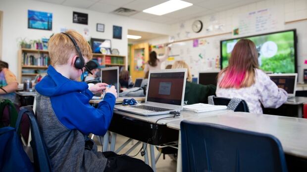 Students in teacher Kathryn Fraser's Grade 5/6 French Immersion class at Ecole Percy Pegler School in Okotoks, AB on January 25, 2022. The class opened its doors for a photo essay on how the school is navigating the COVID-19 pandemic and incorporating lessons from online school into its student wellbeing and conceptual learning model. Students in teacher Kathryn Fraser's Grade 5/6 French Immersion class at Ecole Percy Pegler School in Okotoks, AB on January 25, 2022. The class opened its doors for a photo essay on how the school is navigating the COVID-19 pandemic and incorporating lessons from online school into its student wellbeing and conceptual learning model.