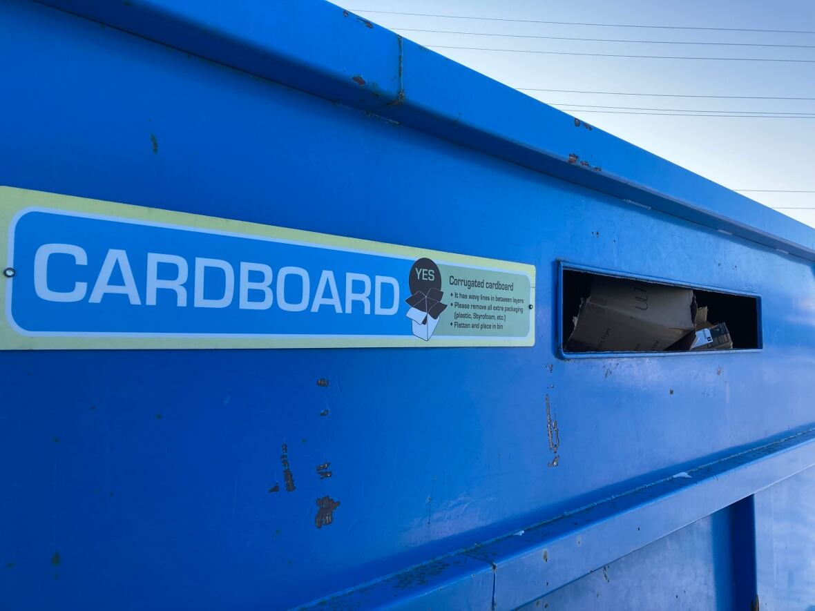 A closeup of a recycling blue bin for cardboard in Yellowknife.