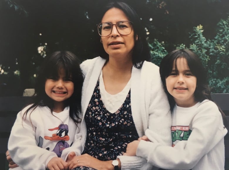 A family poses for a picture. 