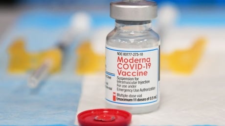 A bottle of COVID-19 vaccine is seen in Los Angeles in December 2021