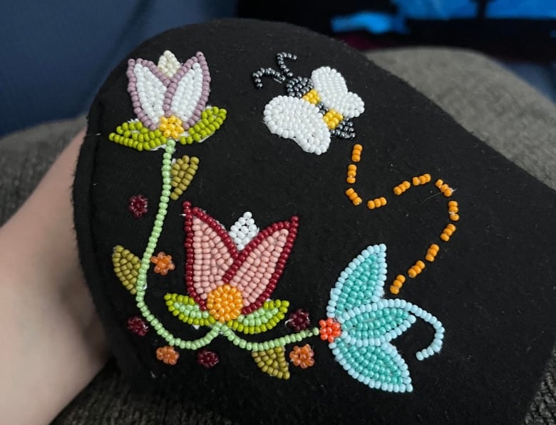 These beaded masks are bringing together a whole new community to find  healing