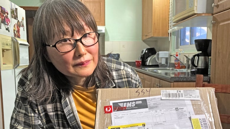 Her mail was opened, her Apple Watch stolen and this woman blames Canada  Post | CBC News