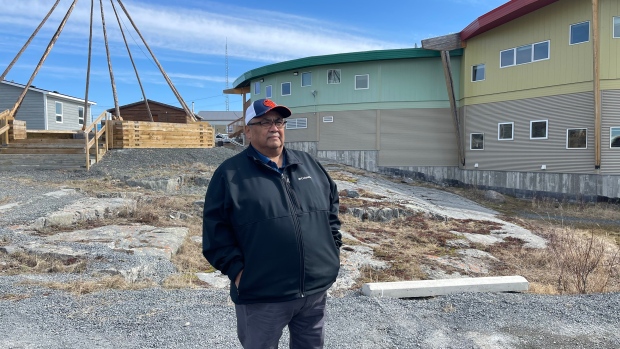 'Joking, even in difficult times': Remembering Edward Sangris, former chief of Dettah, N.W.T.; Man stands in black jacket outside\.