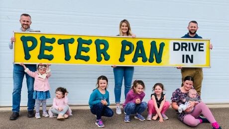 The iconic Peter Pan restaurant sign is back in the Hill family's hands. Matthew, Emma and Cameron Hill show off the sign with Willa, Mia, Freya, Olivia, Sadie, Isabella and Coby. Peter Pan sign