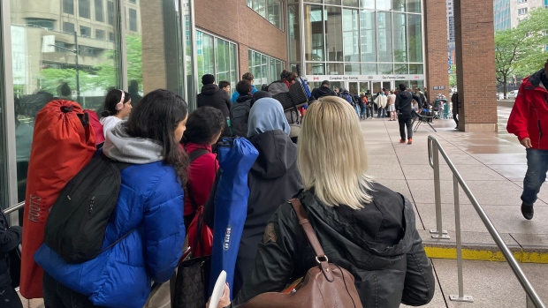 After days in line, Montreal travellers finally receive appointments for passport renewals; 