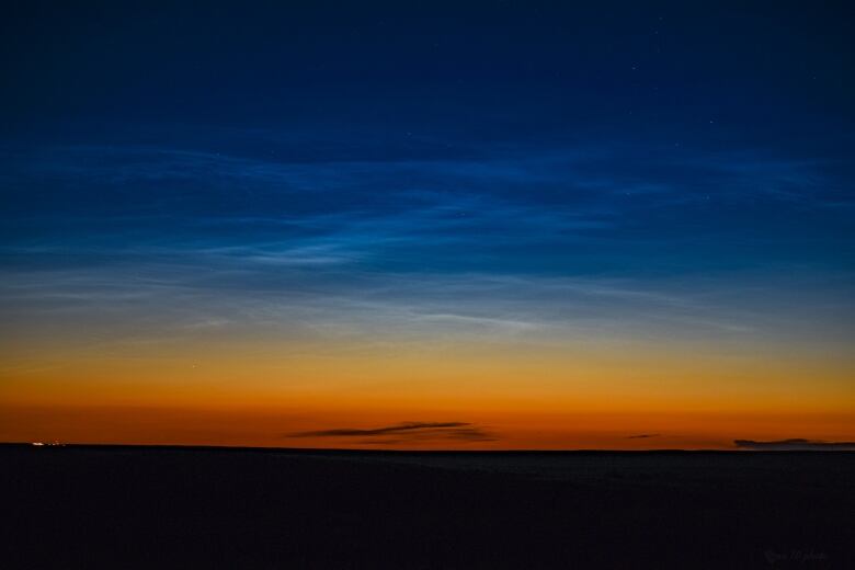 Electric-blue, shimmering clouds begin their annual appearance