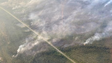 Photo dated June 28 showing the Finlayson Fire (RR-001) crossing the Robert Campbell Highway. Wildland Fire is working with Highways and Public Works to make the highway accessible as soon as possible. Finlayson Fire (RR-001)