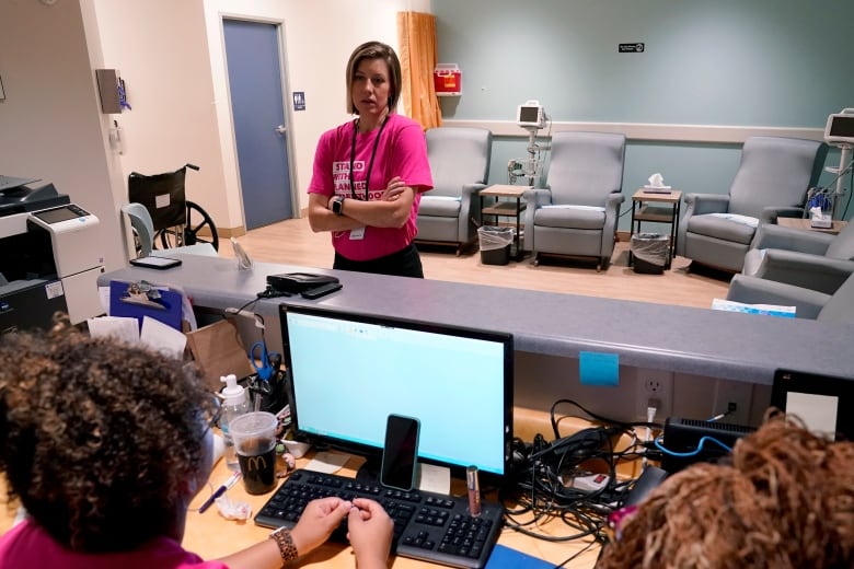 Jill Gibson, medical director of Planned Parenthood Arizona, speaks to her staff on Thursday, June 30, 2022 at the Planned Parenthood facility in Tempe, Ariz. 