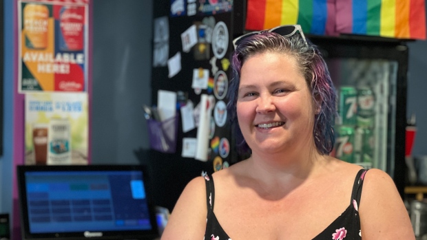 Community members push forward with Pride events despite formal cancellation; Diane Wilson, owner of Monarch, volunteers her time each Wednesday to open up the drop in early for the Produce Pantry\.  