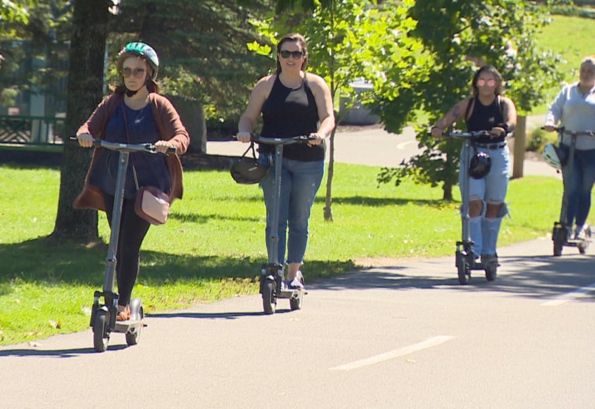 Riding an escooter without a helmet in Fredericton could soon be illegal CBC News