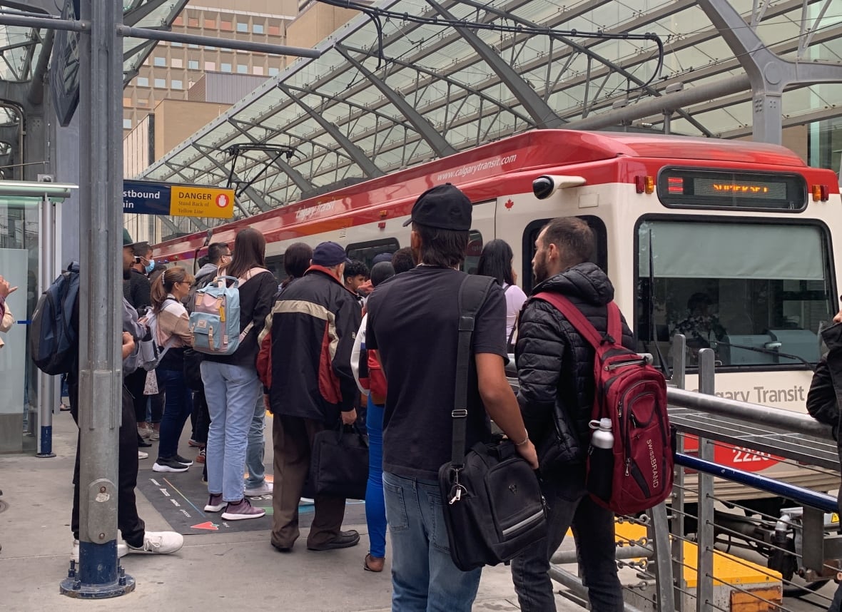 People crowded around a train