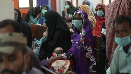 The CBC's Margaret Evans reports from Pakistan, where a deadly monsoon season has led to severe flooding, and fear of disease is on the rise while medical care is hard to find. Fear of disease in Pakistan in aftermath of rain, flooding