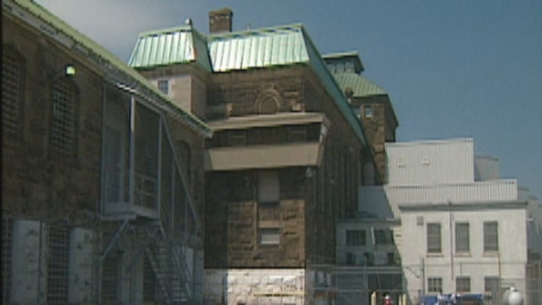 A ample  aged  grey chromatic  gathering  with a greenish  metallic  roof.