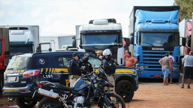 Brazil awaits Bolsonaro comment on election as top court orders end to trucker blockades | CBC News
