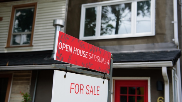 Hoping to buy your first home? It's getting harder to qualify without help from parents; A for sale sign sits in front of a Toronto home, on July 6, 2022\. Numbers out this morning from the Toronto Regional Real Estate boards, show home sales were down 41% in June over last year\.