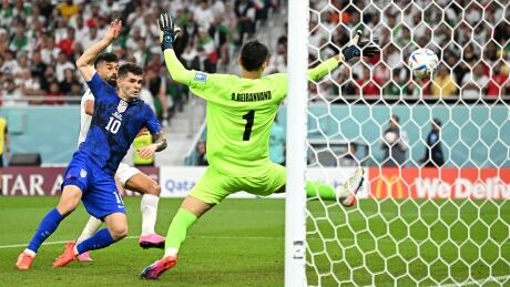 Christian Pulisic scores the lone goal during the United States' 1-0 win over Iran in Group B action on Tuesday in Doha, Qatar. Pulisic-29112022