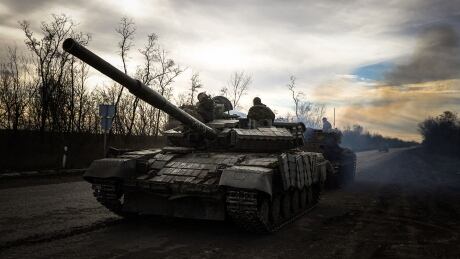 A Ukrainian tank rolls on a road near Bakhmut, in the Donetsk region, on November 30, 2022, amid the Russian invasion of Ukraine. 1245250764