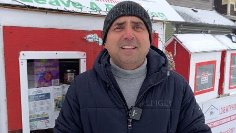 Syed Najam stands outside on of his eight food banks in the city. He says he’s seeing more demand than ever in the run up to Christmas this year. Syed Najam