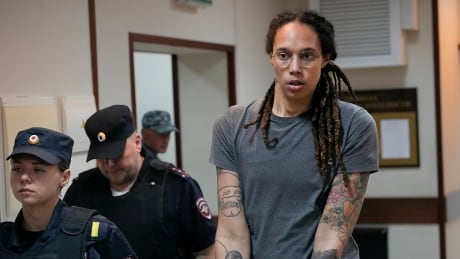 WNBA prima and two-time Olympic golden medallist Brittney Griner is escorted from a courtroom successful Moscow connected Aug. 4. She was convicted successful Russia connected a cause possession charge. Russia US Prisoner Exchange
