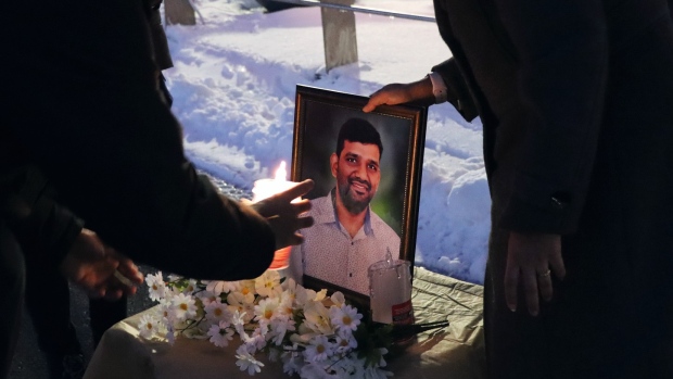 Father of N.S. student who died in Cape Breton house fire sues landlords, tenants; Several students placed plastic candles alongside a photograph of Rajesh Kumar Gollapudi, 33, who was killed in a Sydney, N\.S\., house fire in mid-December\. 