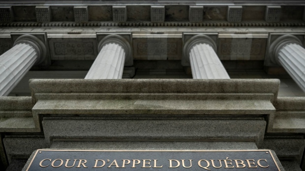 Quebec Court of Appeal upholds requirement for underage teens seeking sex designation change; The sign for the Quebec Court of Appeal is seen in this ant's eye view\. 
