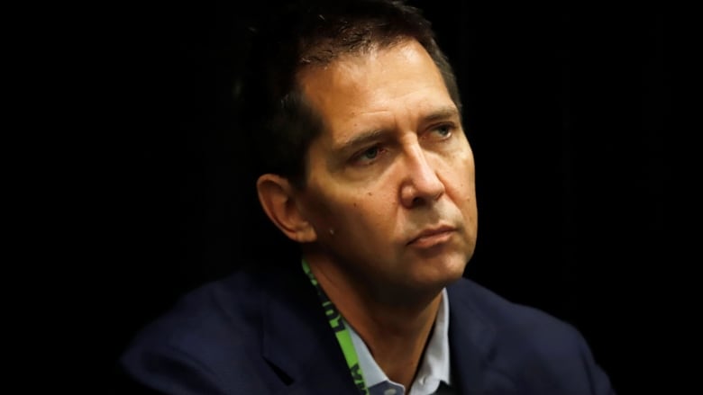 Wayne Stensby listens during a 2021 press conference in San Juan, Puerto Rico. The Canadian CEO and president LUMA Energy, has become a divisive figure on the island, taking the brunt of public anger over blackouts, power surges and rate hikes.