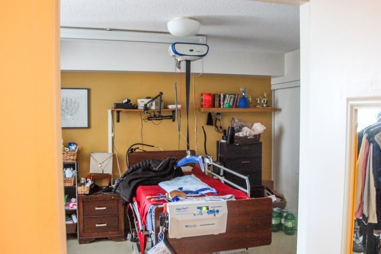 Travis Iverson's bedroom is equipped with a motorized bed lift.