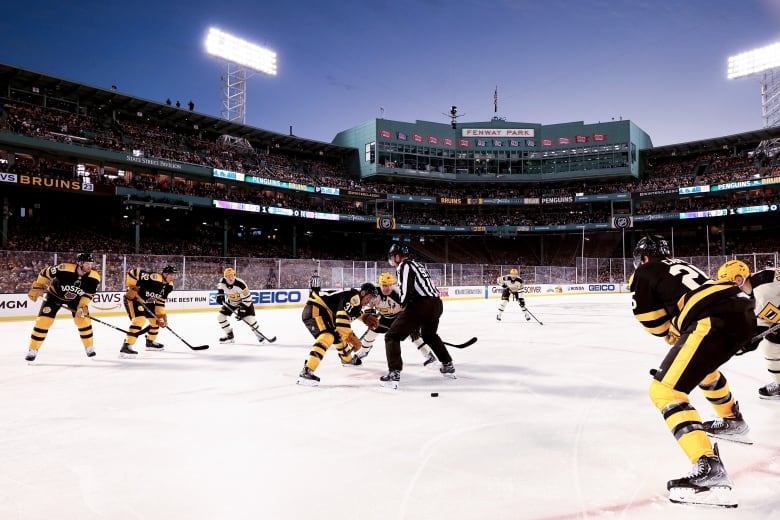 Hockey games are played outdoors on what is usually a baseball field.