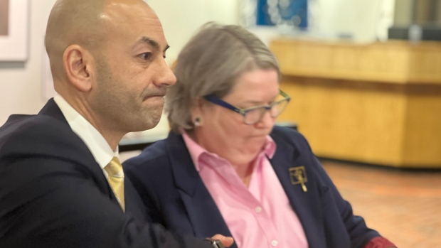 A strained relationship in the Yukon legislature holds — for now; Yukon Premier Ranj Pillai shakes hands with NDP Leader Kate White in Whitehorse, after renewing the Confidence and Supply Agreement that will keep the Liberals in power for the foreseeable future\.