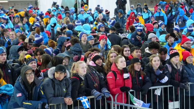 Whitehorse confirmed as host of the 2026 Arctic Winter Games; Athletes and other participants crowd the stage at at the closing ceremonies on Saturday\.