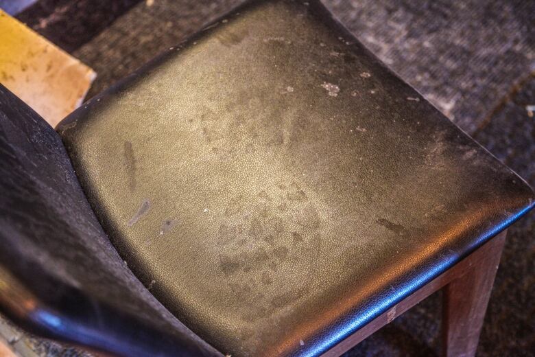 A restaurant chair used by the thieves during the heist bears a footprint.