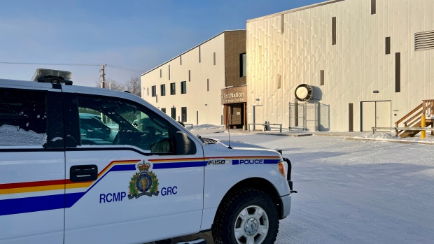 Fort Smith man convicted of murder receives youth sentence of 7 years; RCMP vehicles parked outside the Salt River First Nation Business & Conference Centre in Fort Smith, where the inquest is being held\.