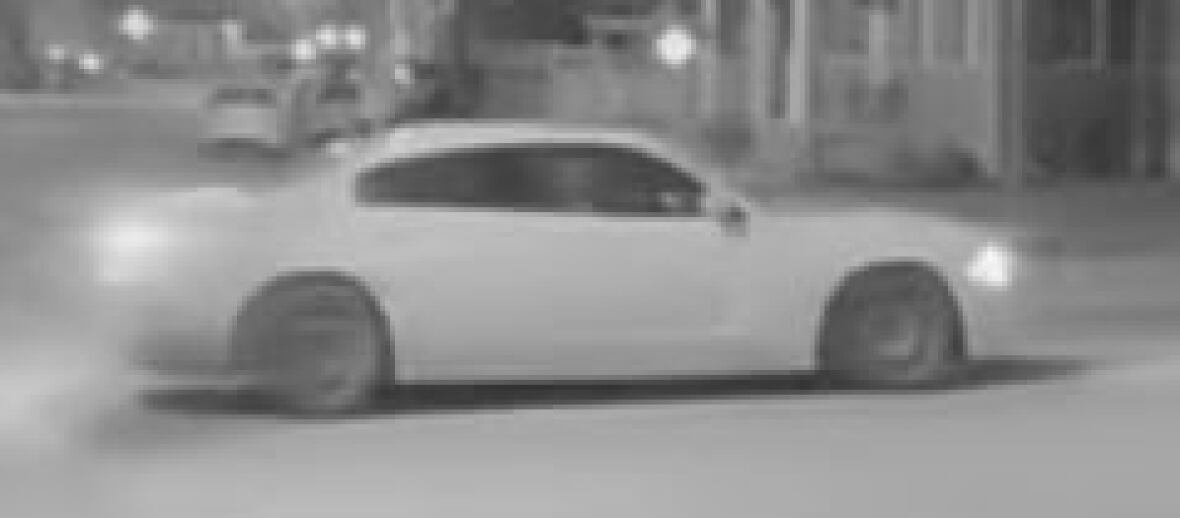 A white vehicle is seen.