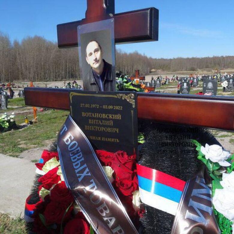 Vitaly Votanovsky received this image with his picture and name on a grave at a cemetery. He has received death threats for posting videos to social media of crowded burial grounds filled with Russian fighters killed in Ukraine. 