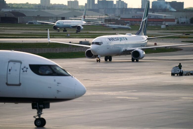 A WestJet plane is seen at Toronto's Pearson airport in May of 2022.