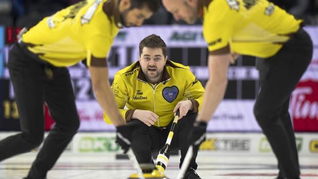Matt Dunstone seeks curling worlds berth in Brier final against defending champ Gushue; Manitoba skip Matt Dunstone calls a sweep on a shot against Wild Card 1's Brendan Bottcher during semifinal action at the Brier in London, Ont\. Dunstone stole two points for a 7-5 victory\.