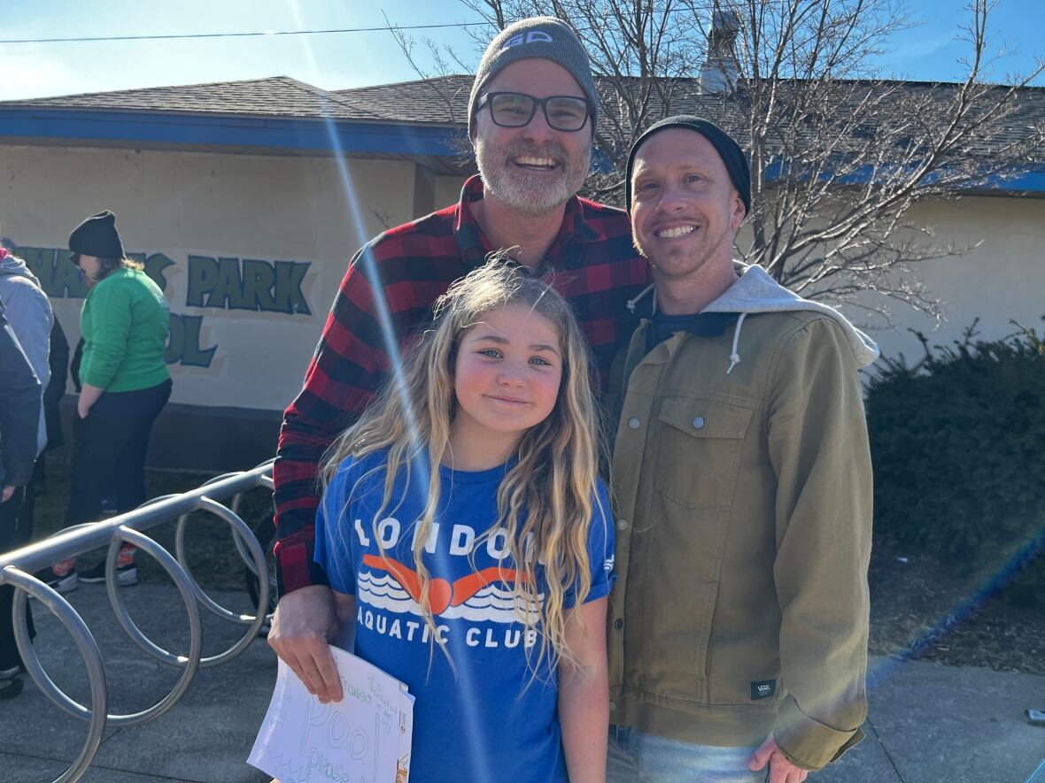 Retired Paralympian Adam Purdy (right) and Jason Wedlake (left) with his daughter Emily